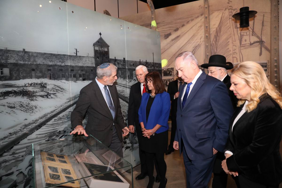 The Vice President and Second Lady viewing "The Auschwitz Album," which documents the selection process at the death camp